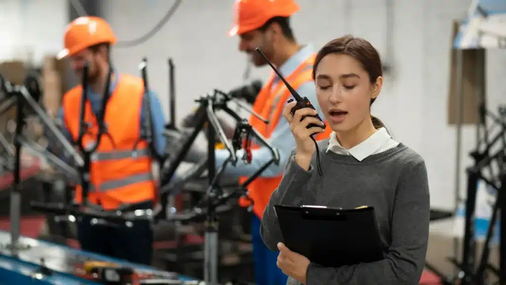 Safety and Compliance Officer inspecting operations at a metal recycling facility